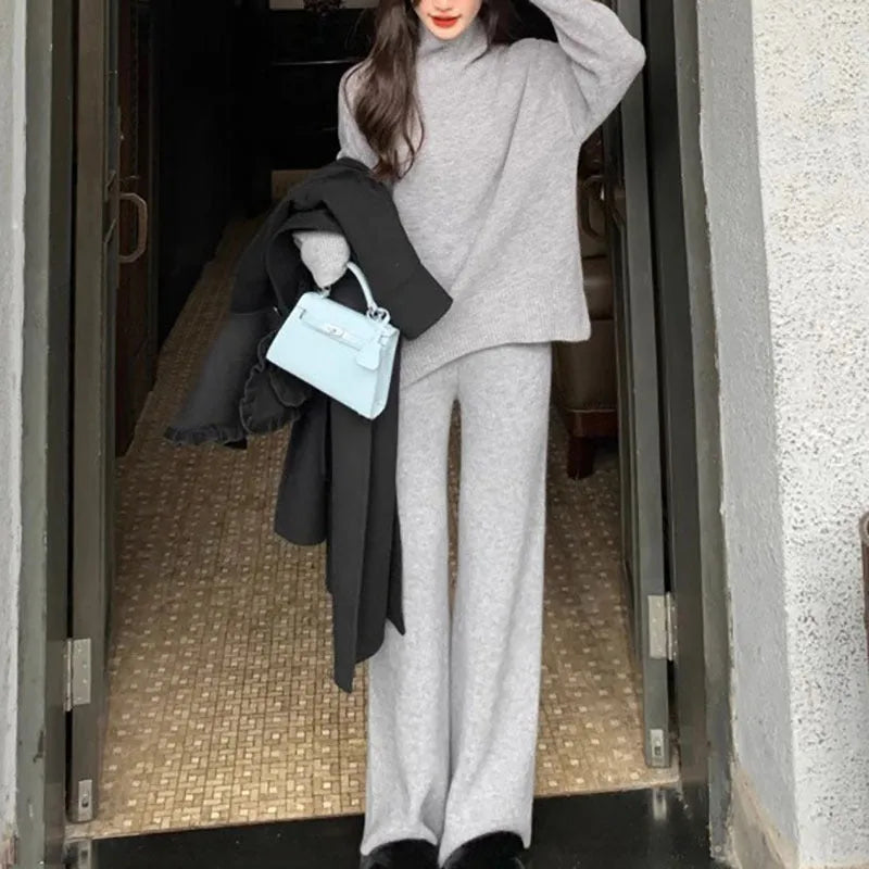 Women's milky white acrylic knit sweater and wide-leg trousers two-piece set for commuting.