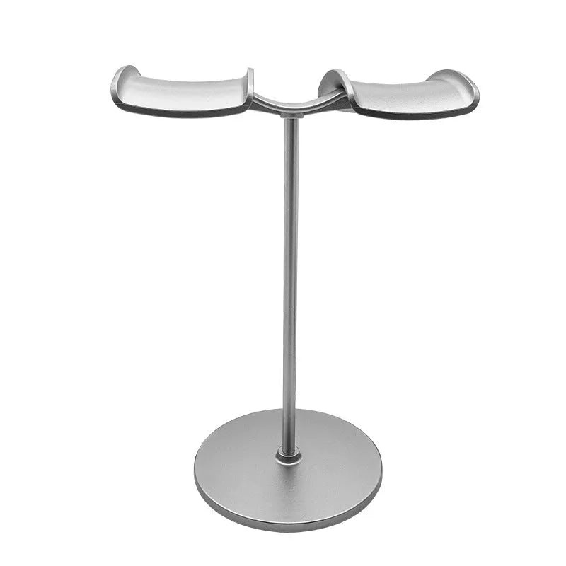 Desktop double-hanging earphone bracket in double-headed black holding two headphones on a desk