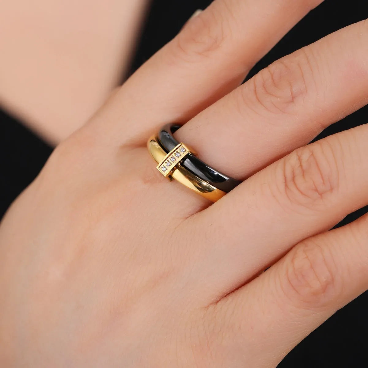 Women's heart-shaped double ring made of titanium steel with glossy stitching and zirconium inlay.