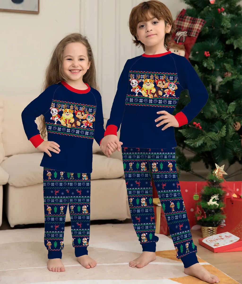 Matching family Christmas pyjamas set with plaid and deer print for adults, children, baby, and dog