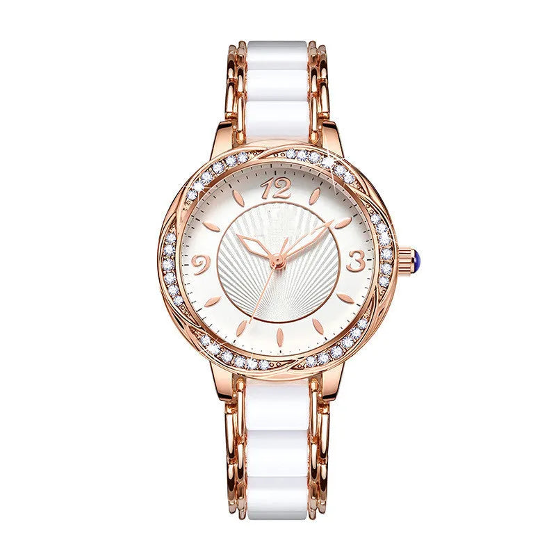 Women's quartz watch with ceramic-style steel strap, alloy case, and 31.1mm white dial in rose gold
