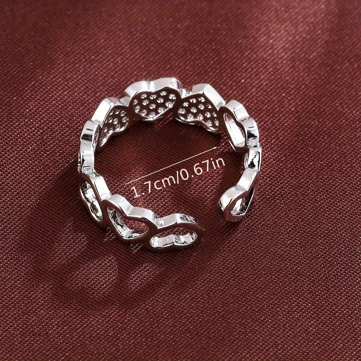 Geometric gold couples ring with heart engraving on an adjustable open band