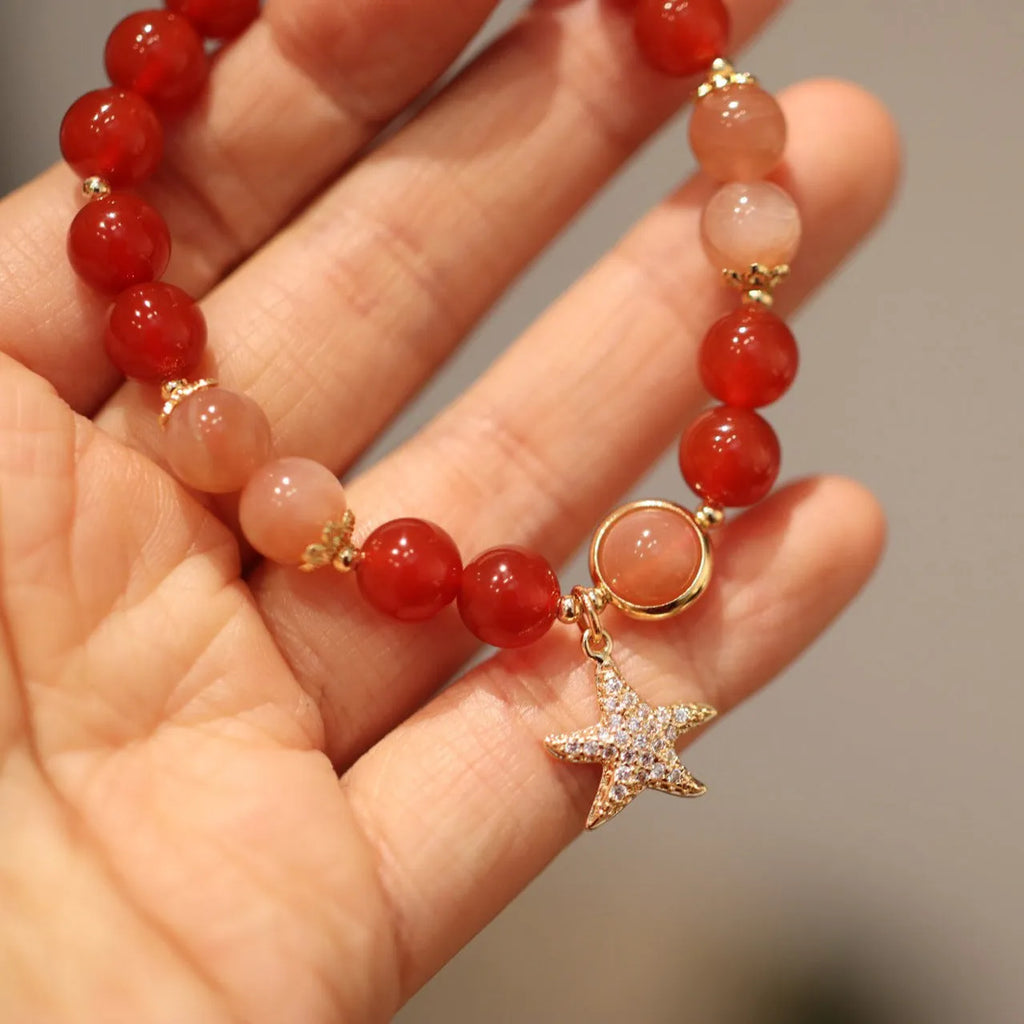Handmade red agate and Sands Orange Sunstone ethnic bracelet for women with 8mm beads and star design.