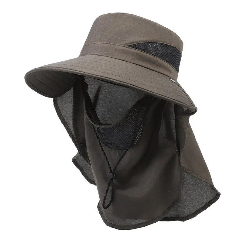 Men's khaki polyester fisherman hat with wide brim on a wooden fence, showing adjustable inner drawstring.