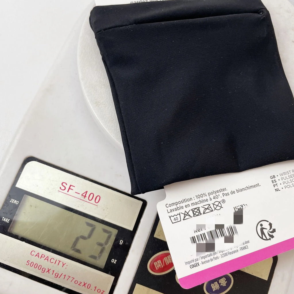 Wrist bag armband sleeve showing 10cm by 10.5cm phone compartment and protective packaging.