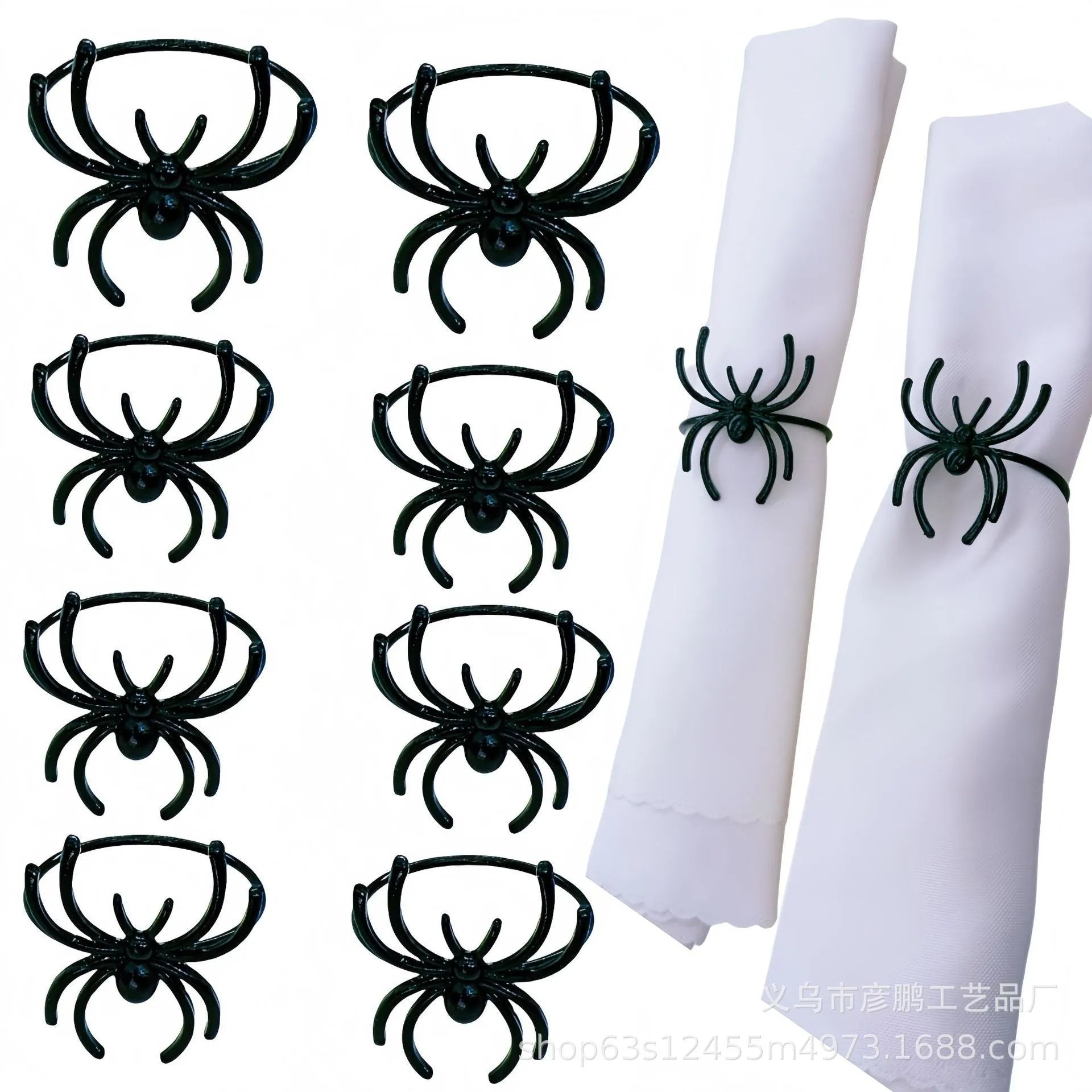 Six black alloy spider-shaped napkin rings on a dark table, showing detailed legs and a 5cm height.