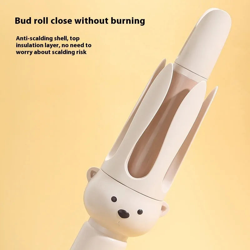 Beige anion automatic hair curler with hair stick on a white background.