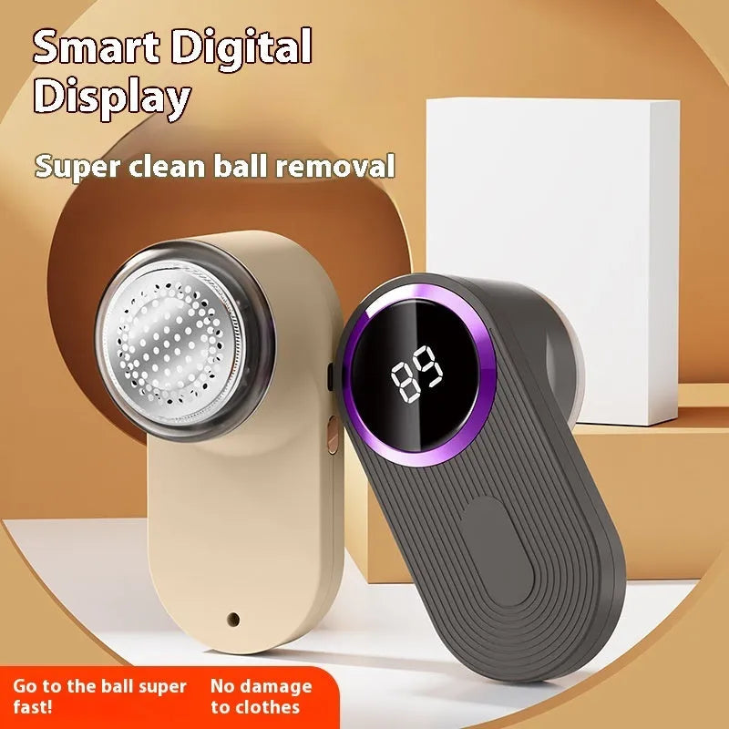 Portable electric clothes fur ball shaver in light gray with blade cover closed, battery-operated lint remover for sweaters