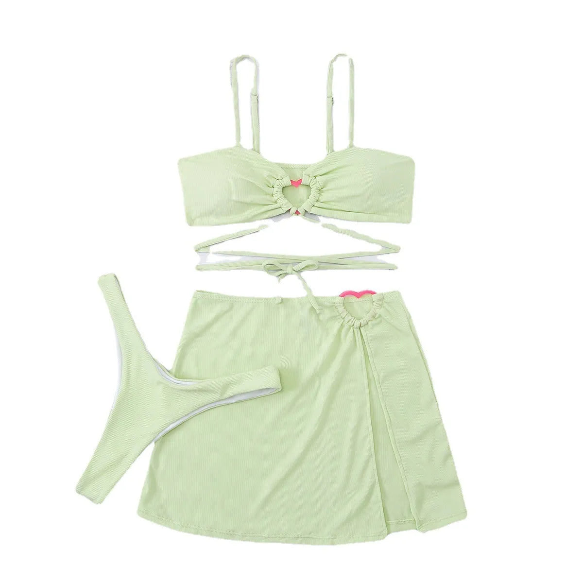 Three-piece women's bikini swimsuit with lace heart design in fruit green colour, shown on mannequin