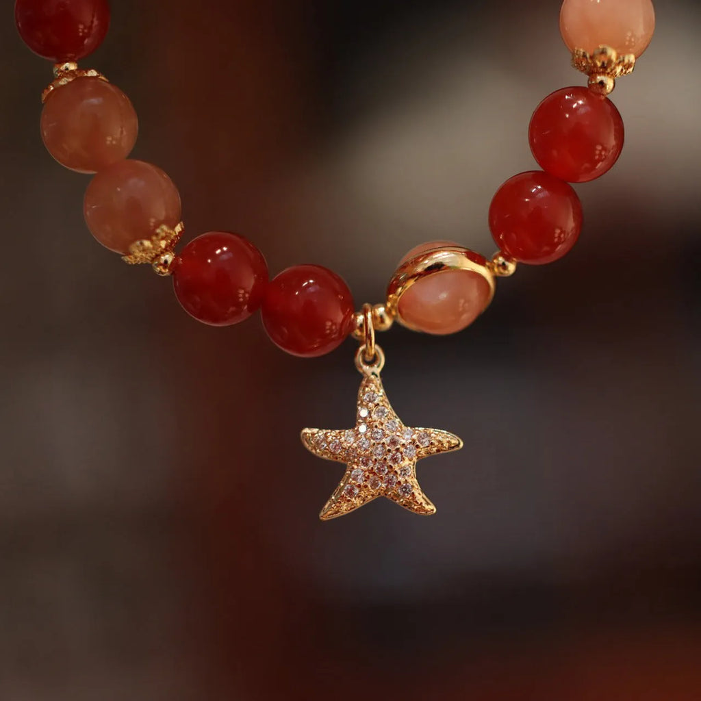 Handmade red agate and Sands Orange Sunstone ethnic bracelet for women with 8mm beads and star design.
