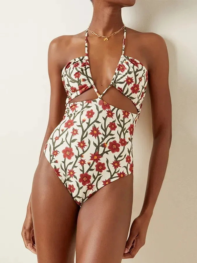 Women's two-piece swimsuit set with halter neck design and floral pattern gauze skirt