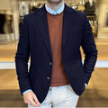 Men's loose retro cotton suit jacket in army green colour showing loose fit and tailored details