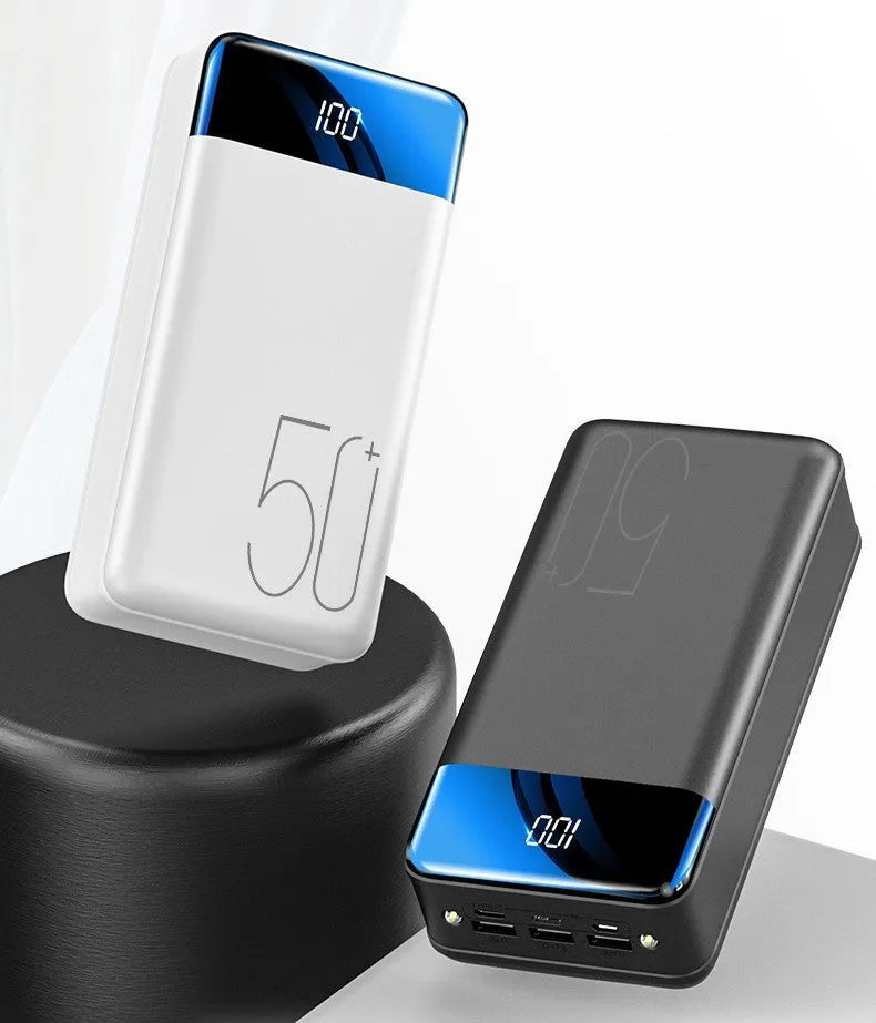 Black and white 50000mAh power bank with three USB output ports, showing dimensions of 169mm x 83mm x 52mm