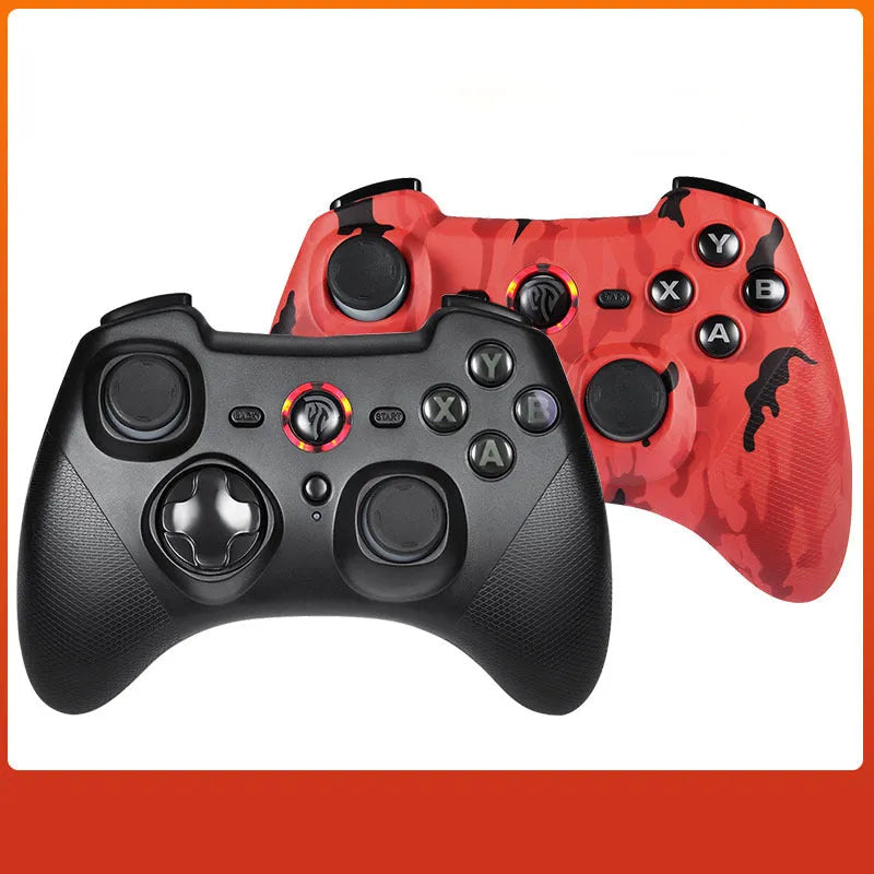 Black dual-mode wireless PC game controller with coloured buttons on a desk next to its storage bag and adapter.