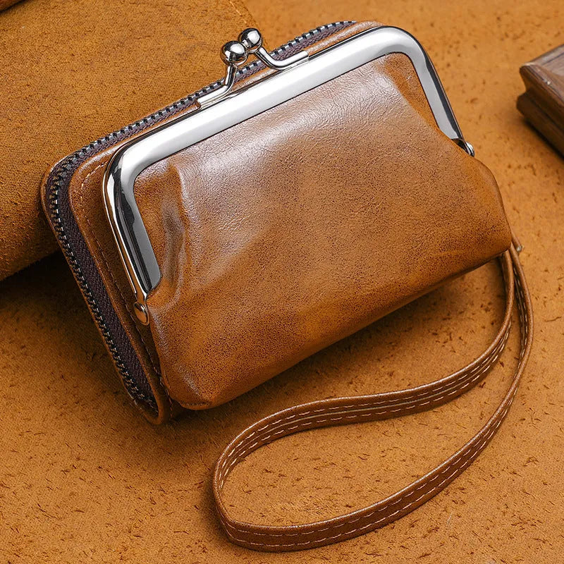 Round ladies coin purse with snap fastener and detachable metal clip, shown in assorted colours.