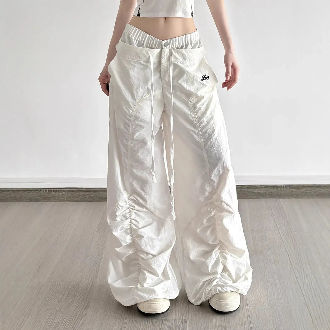 White ruffle drawstring lace letters embroidered slacks with high waist and multiple pockets