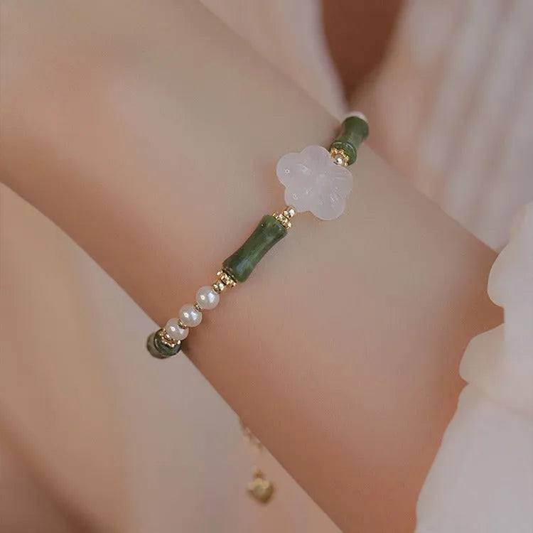 Women's Chinese style Hetian jade bracelet with bamboo joint design and shell pearl beads