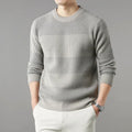 Men's thick long sleeve round neck chenille sweater in beige, shown on a model for autumn casual wear.