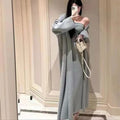 Women's grey knitted dress with matching cardigan coat, featuring regular sleeves and a long skirt.