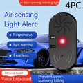 Black ABS plastic car door reminder alarm with infrared sensor and micro USB port.
