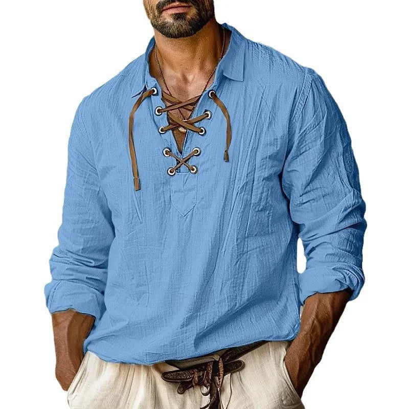 Men's loose blue linen-blend shirt with lapels and long sleeves on a hanger.