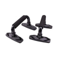 A pair of I-shaped black push up bars with blue PP sponge grips on a grey floor.