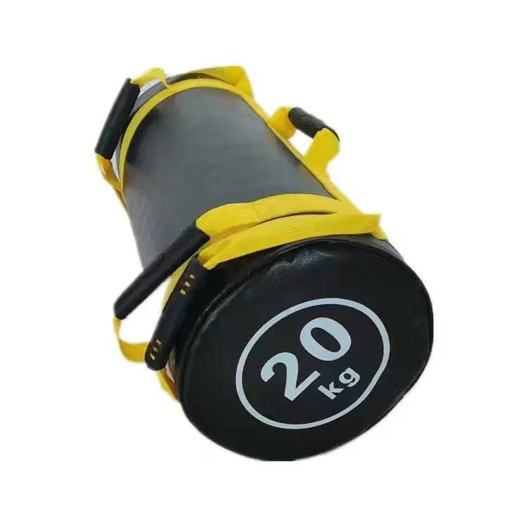 Flat white PVC fitness sandbag for weight training on a gym floor.