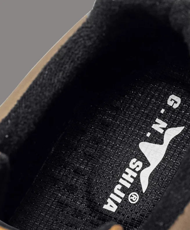 Black and white platform casual sneakers with chunky rubber soles on a white background