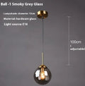 Modern round glass ball chandelier ceiling light in Nordic style with spherical shades.