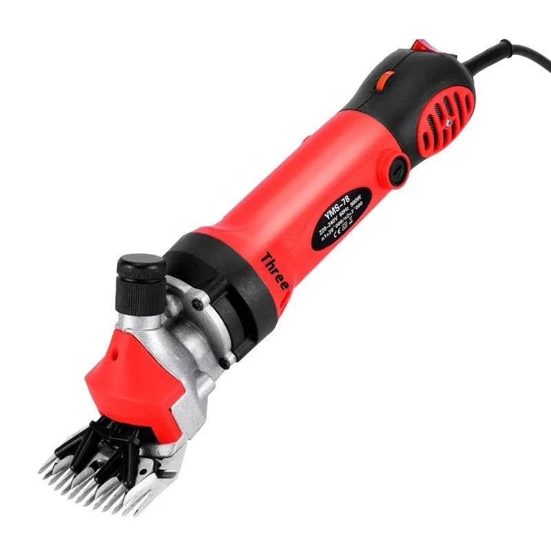 Yellow electric wool shearing handpiece with 110V plug, multiple steel blades, and maintenance tools in a plastic box.