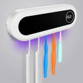 Ivory white wall-mounted UV toothbrush sterilizer holder with digital display showing 360-second timer.