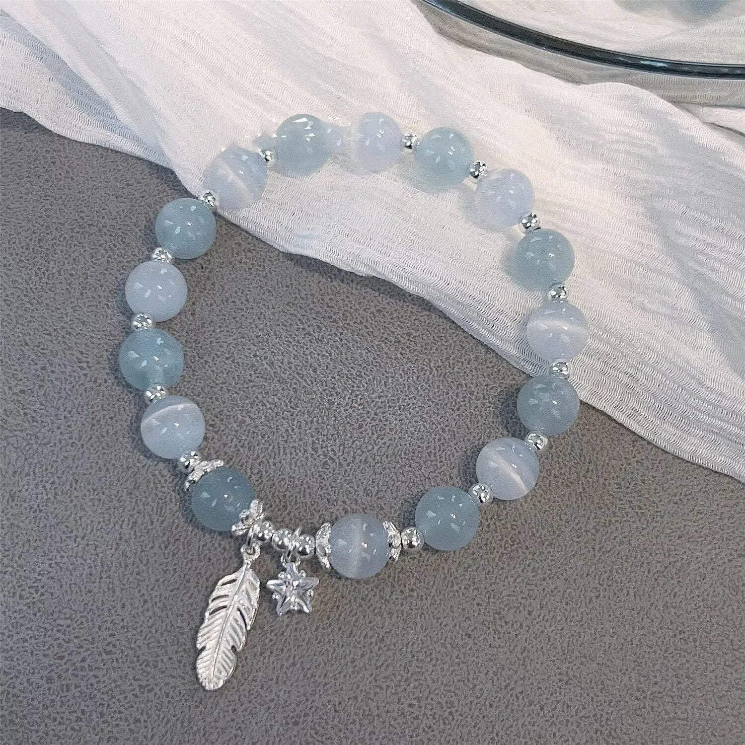 Korean style crystal bracelet with blue moonlight colour and text modelling