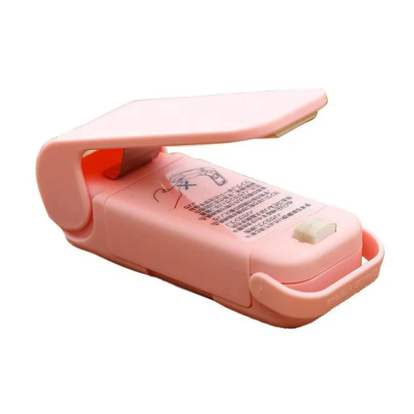 Mini bag sealer in white or pink, 9cm x 4cm x 6cm, with magnetic or non-magnetic option