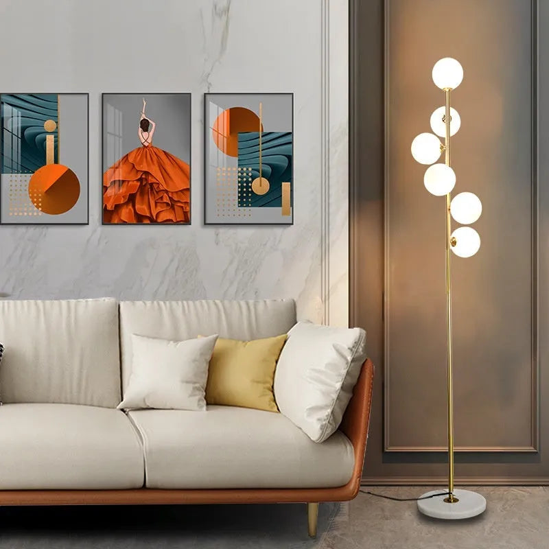 Simple iron floor lamp with 8W LED tricolour bulb in black ribbon gold finish