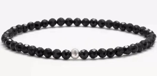 Geometric stone bead bracelet with black agate, blue san, obsidian, and cut surface black agate in chamfered square shapes