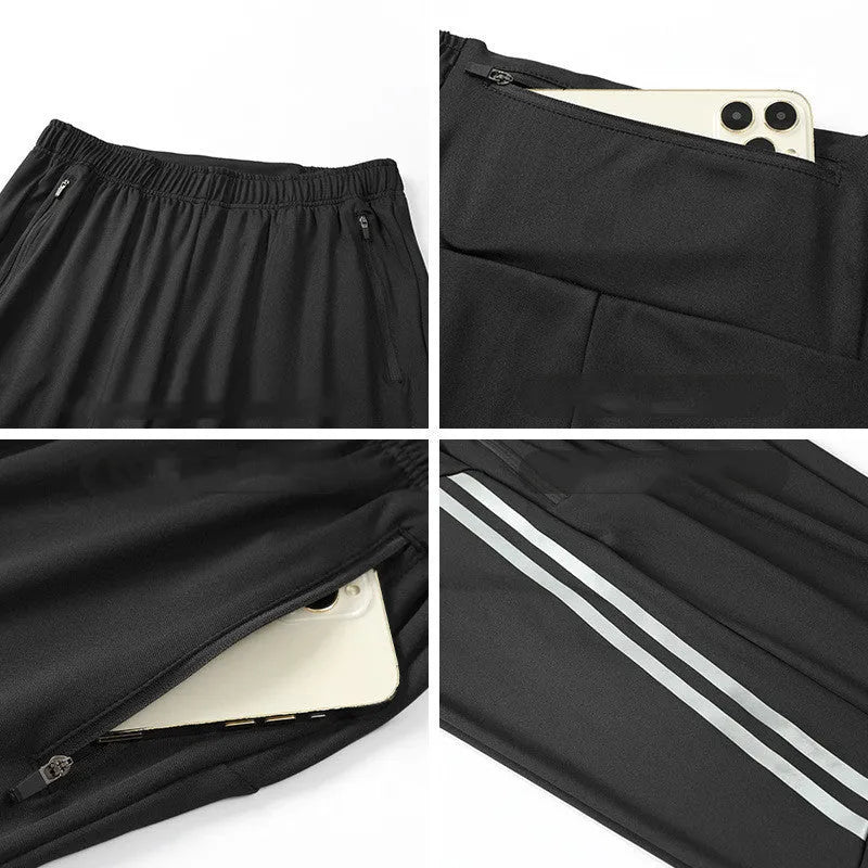 Man wearing black full-length polyester running trousers with a mid waist design.