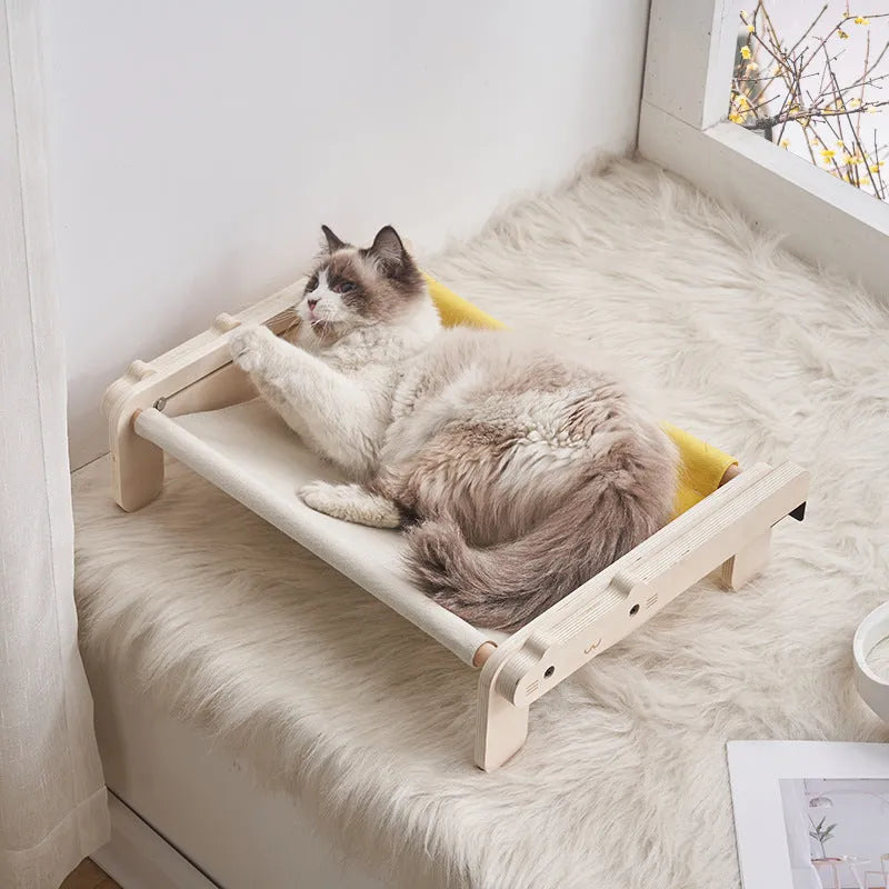 Solid wood pet bed for cats with a removable plaid cover