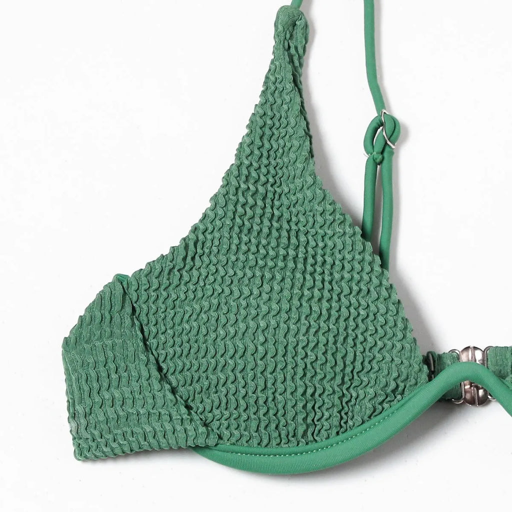 Green women's bikini swimsuit with ruffle detailing and briefs style