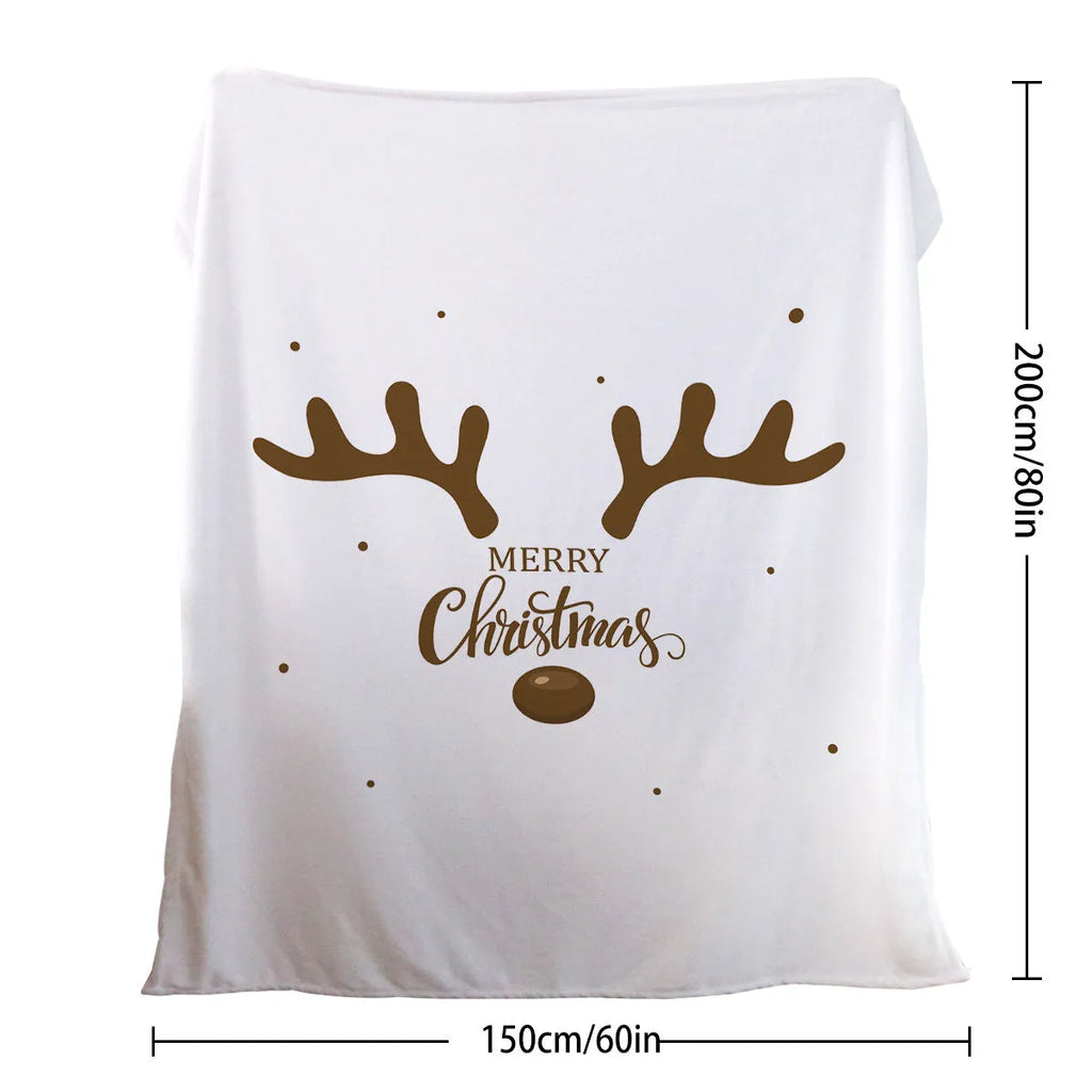 Deer antler pattern Christmas limited edition white flannel velvet blanket on a sofa