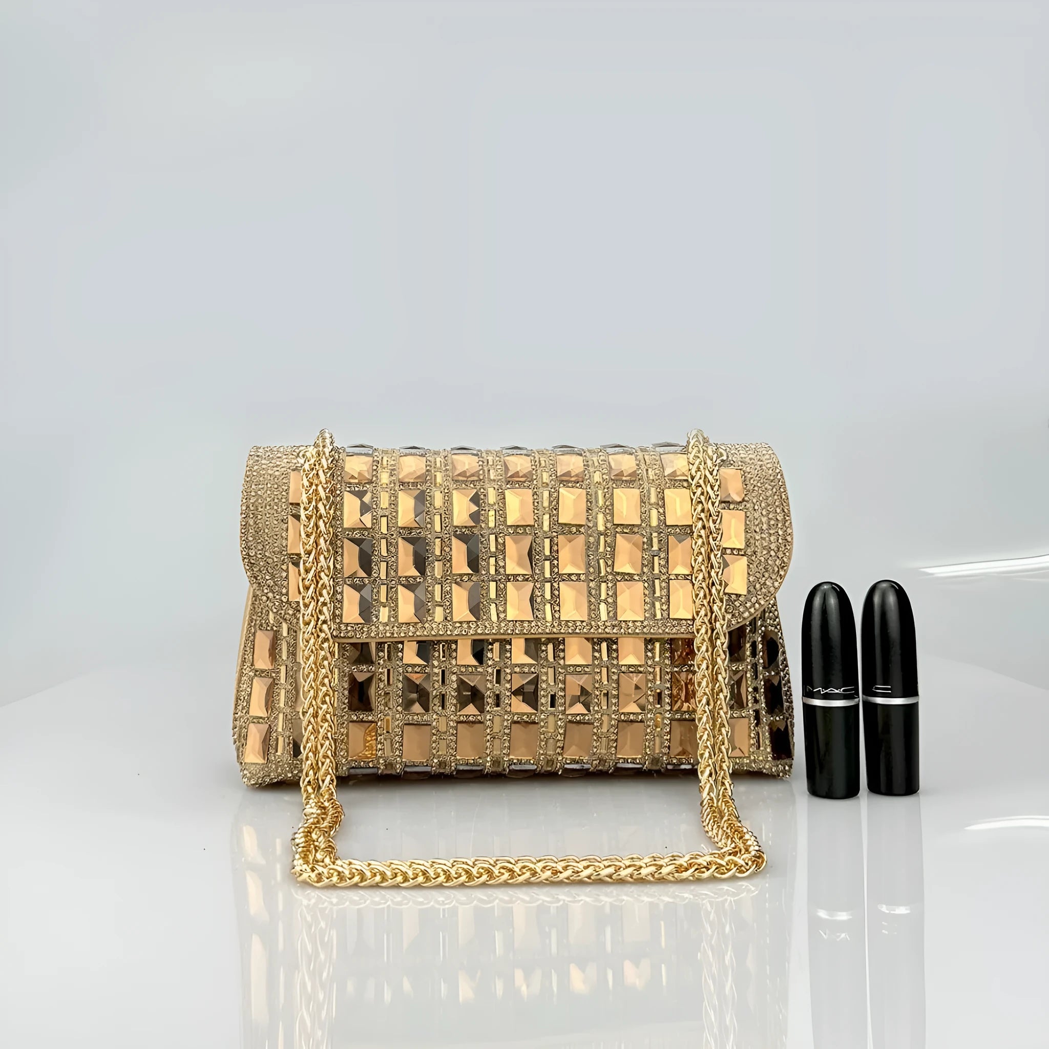 Glass rhinestone chain clutch bag in horizontal square shape with decorative diamonds and chain strap