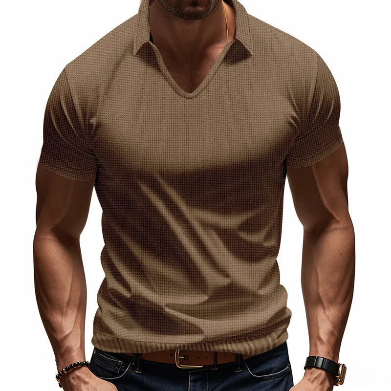 Men's loose-fitting light blue V-neck short-sleeved cotton blend t-shirt laid flat.
