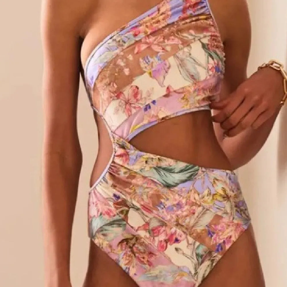 Women's rose gold patterned swimsuit in polyester fabric showing front design