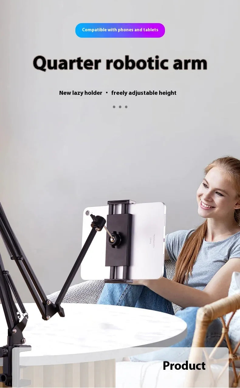 Black foldable metal cantilever bracket holding a tablet on a desktop, showing adjustable arms and clip.