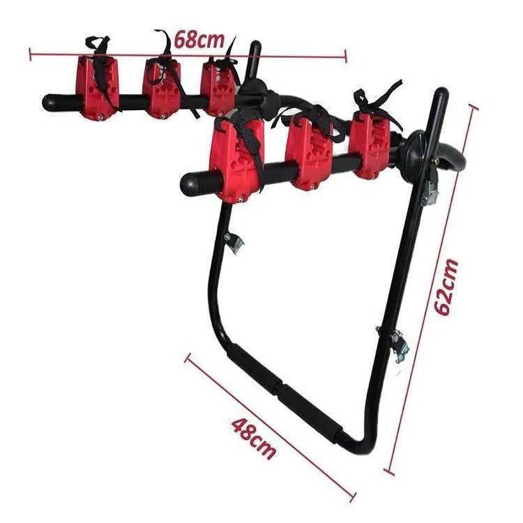 Black and red iron frame bike rack with straps for car boot mounting.
