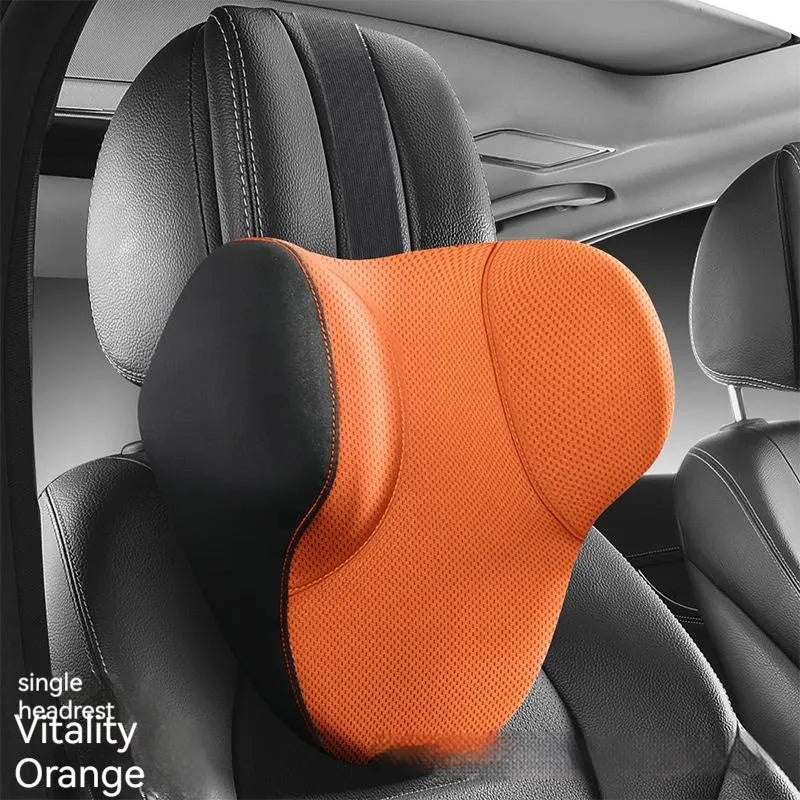 Black memory foam car headrest and lumbar support pillow set on a car seat