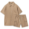 Women's beige casual two-piece set with sleeveless top and elastic waist shorts laid flat.