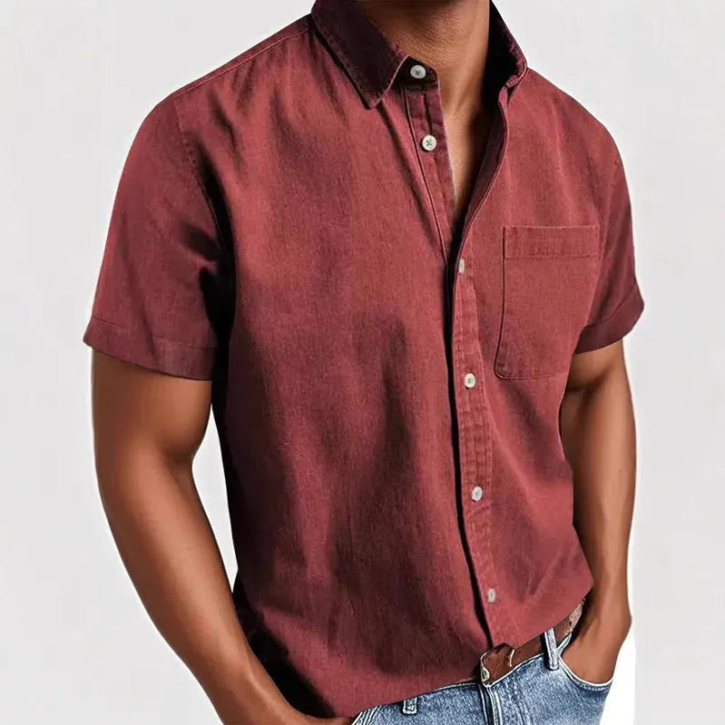 Men's solid colour short-sleeved shirt with a polo collar and a chest pocket.