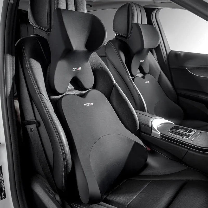 Memory foam car headrest and lumbar support set in grey on a car seat