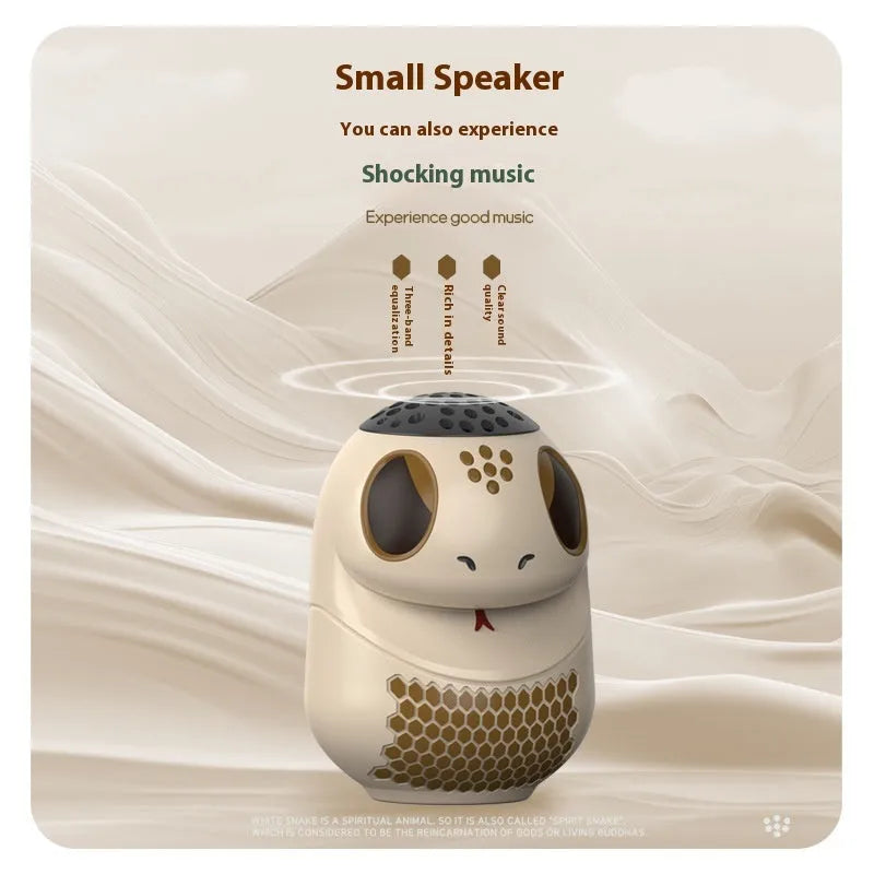 White portable Bluetooth speaker with USB port and functional buttons on a solid background