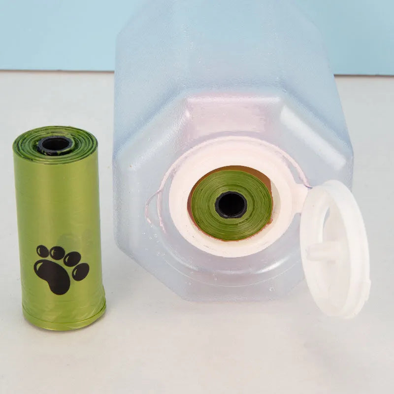 Portable 3-in-1 pet water bottle with 600ml capacity, leak-proof drinker, and poop dispenser in pink